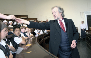 John as a Victorian schoolmaster in our preserved Victorian lecture theatre in the Old Building